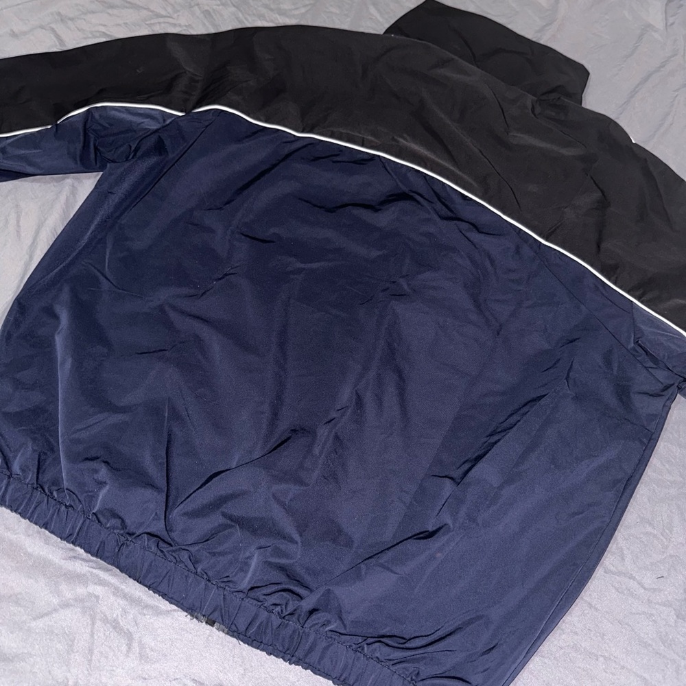 Black and blue bomber jacket